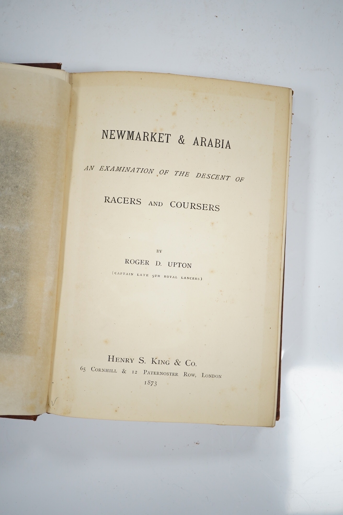 Upton, Roger D. - Newmarket and Arabia: an examination of the descent of racers and coursers. hand coloured frontis. and 4 folded tables; original gilt pictorial cloth, cr. 8vo. 1873